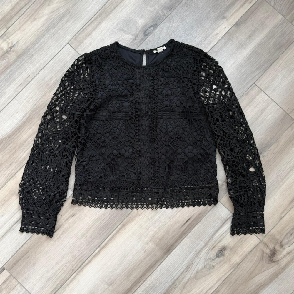 Black lace long sleeve top with geometric cut-out crochet design
